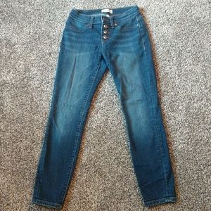 Button fly skinny jeans